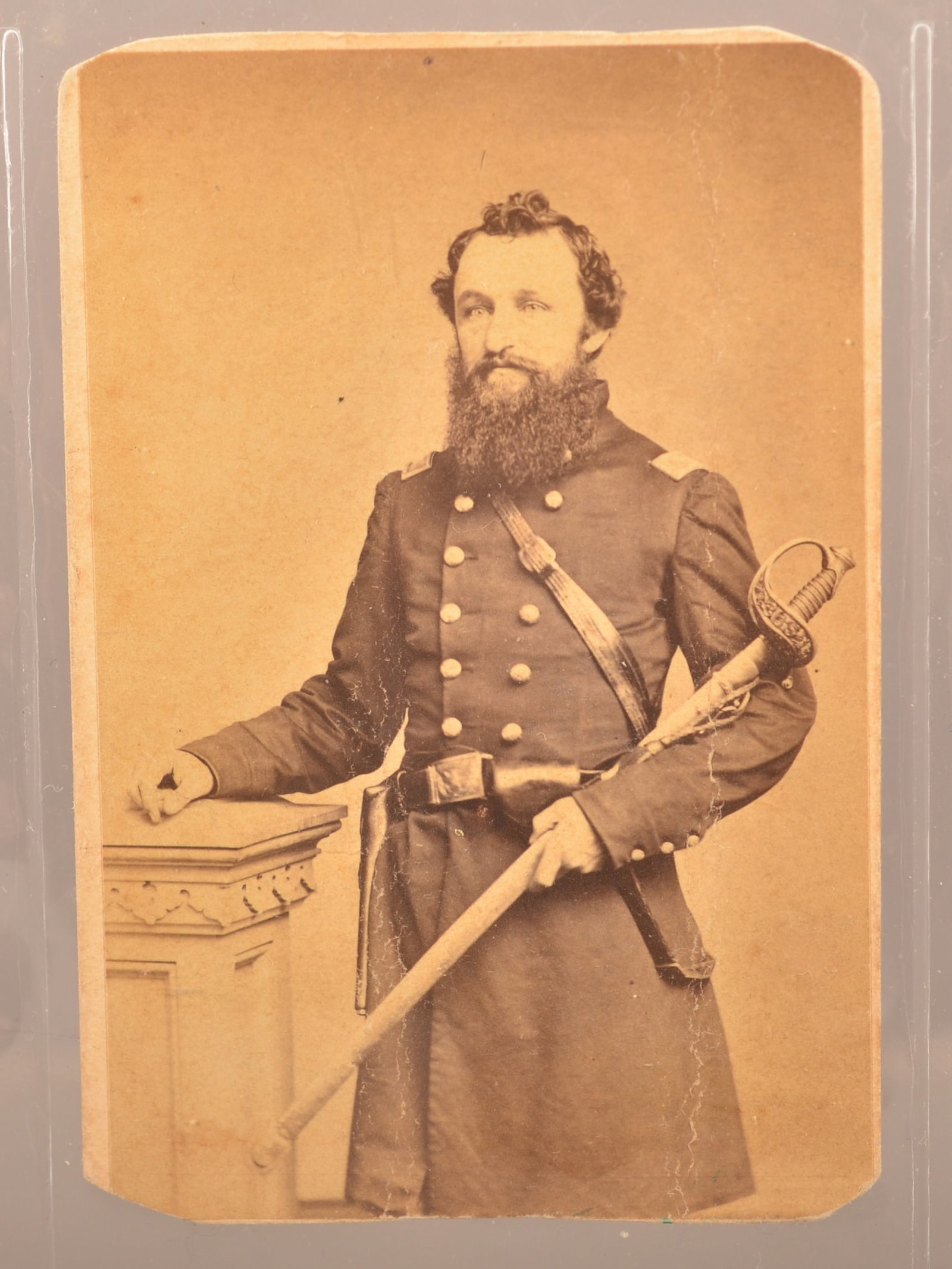 CDV of Col. Charles Albright, Penna.: Trimmed CDV of Albright cradling his sword, taken by Gutekunst, Philadelphia Pa. Well known view of Albright, pencil id'ed on reverse by collector. Commanded the 132nd and 202nd as well as the 34th Mi