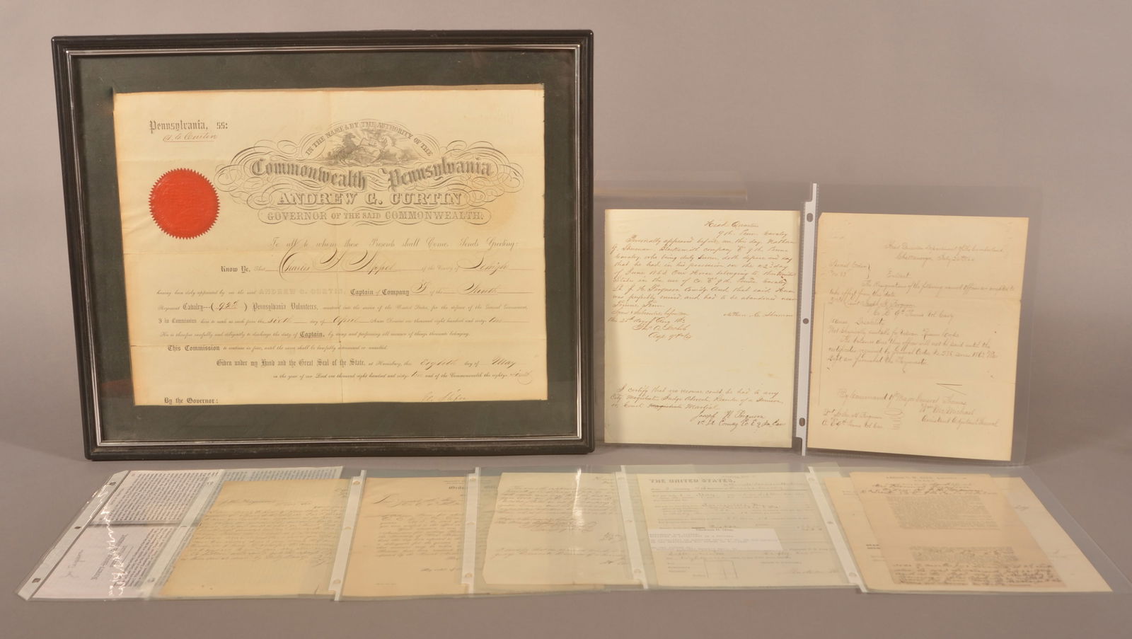 8 Documents from the 9th Pennsylvania Cavalry: Five documents that belonged to Lt Joseph Ferguson, Company E. Three misc. documents and a officer's commission for Charles Appel, Captain Company F.
