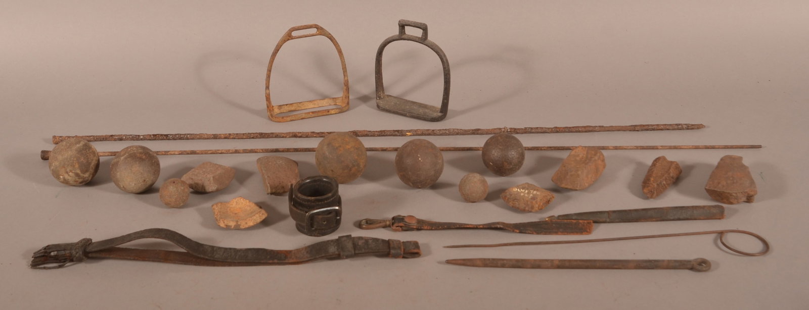 Dug Civil War Cannon Balls, Grapeshot and Misc.: Large lot of items including artillery fragments, carbine socket and ramrods. One fragment with "Olustee FLA" painted on it. Carbine socket appears to be unused- could be Bannerman surplus. One ramrod