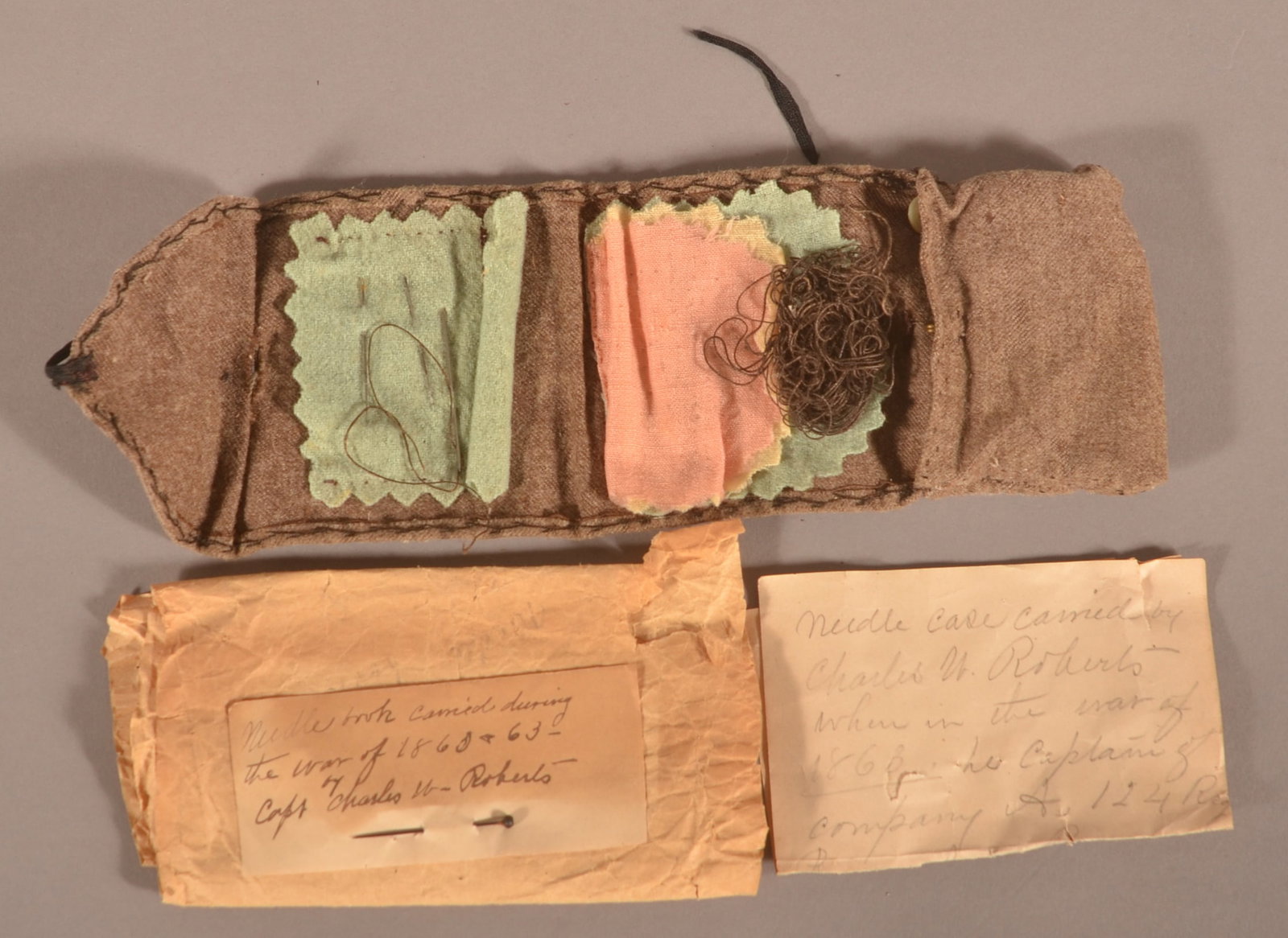 Identified 124th Penna. "Housewife" & Snuff Box: Great wool roll-up "housewife" or "needle book" used by soldiers to carry needles, thread and scraps of material. Period tag in ink states "needlebook carried during the war of 1862 & 63 Capt. Charles