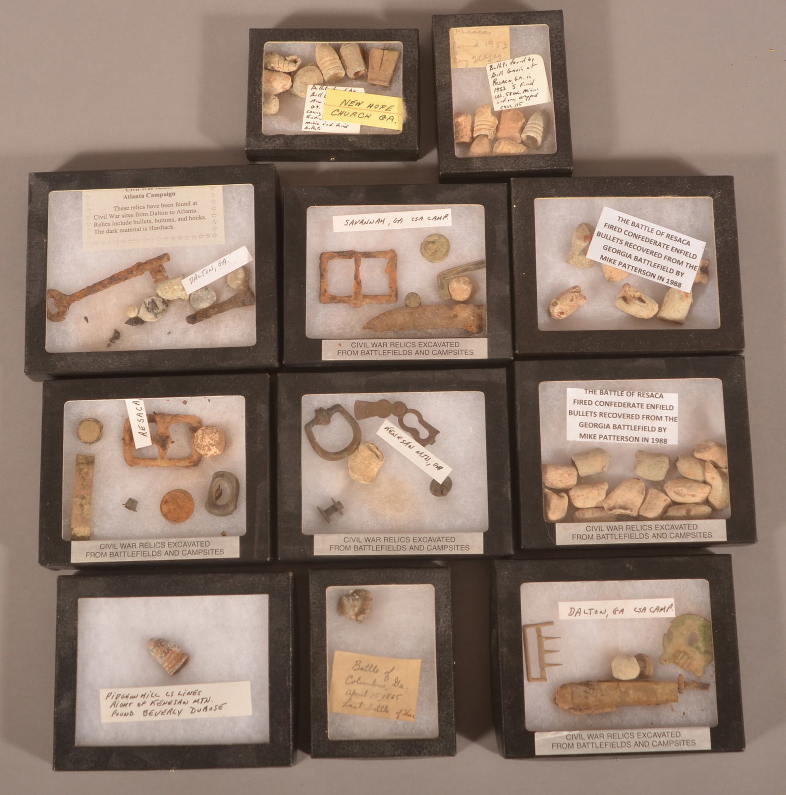 Relics Recovered from Georgia Battlefields: Includes 11 small Riker cases with relics dug in Resaca, Atlanta, Kenesaw Mountain, Columbus, Savannah and Dalton.