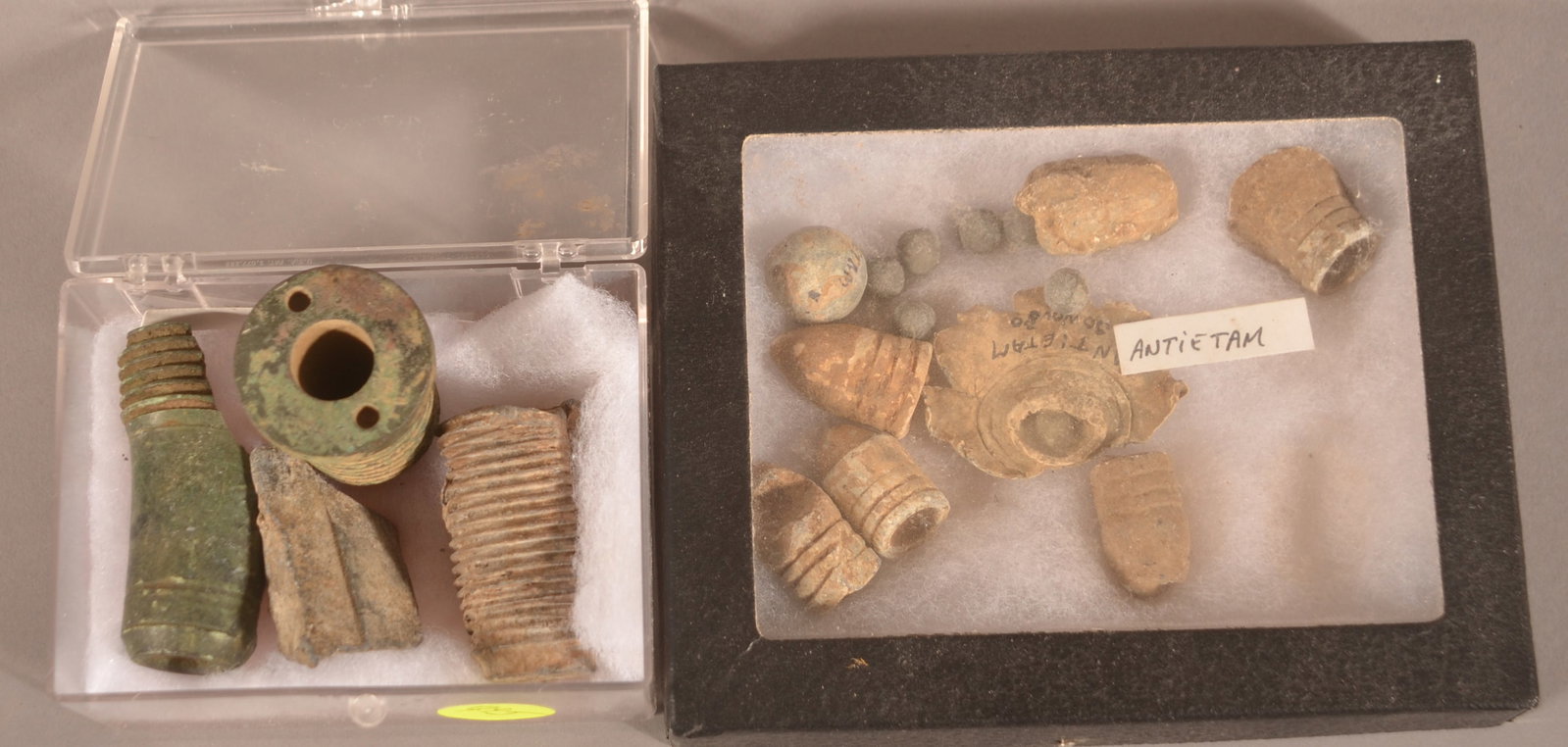 Antietam Civil War Battlefield Relics: Includes 2 cases. One containing the remnants of artillery fuses with collector's tag of Antietam and a group of pistol and rifle rounds also marked Antietam.