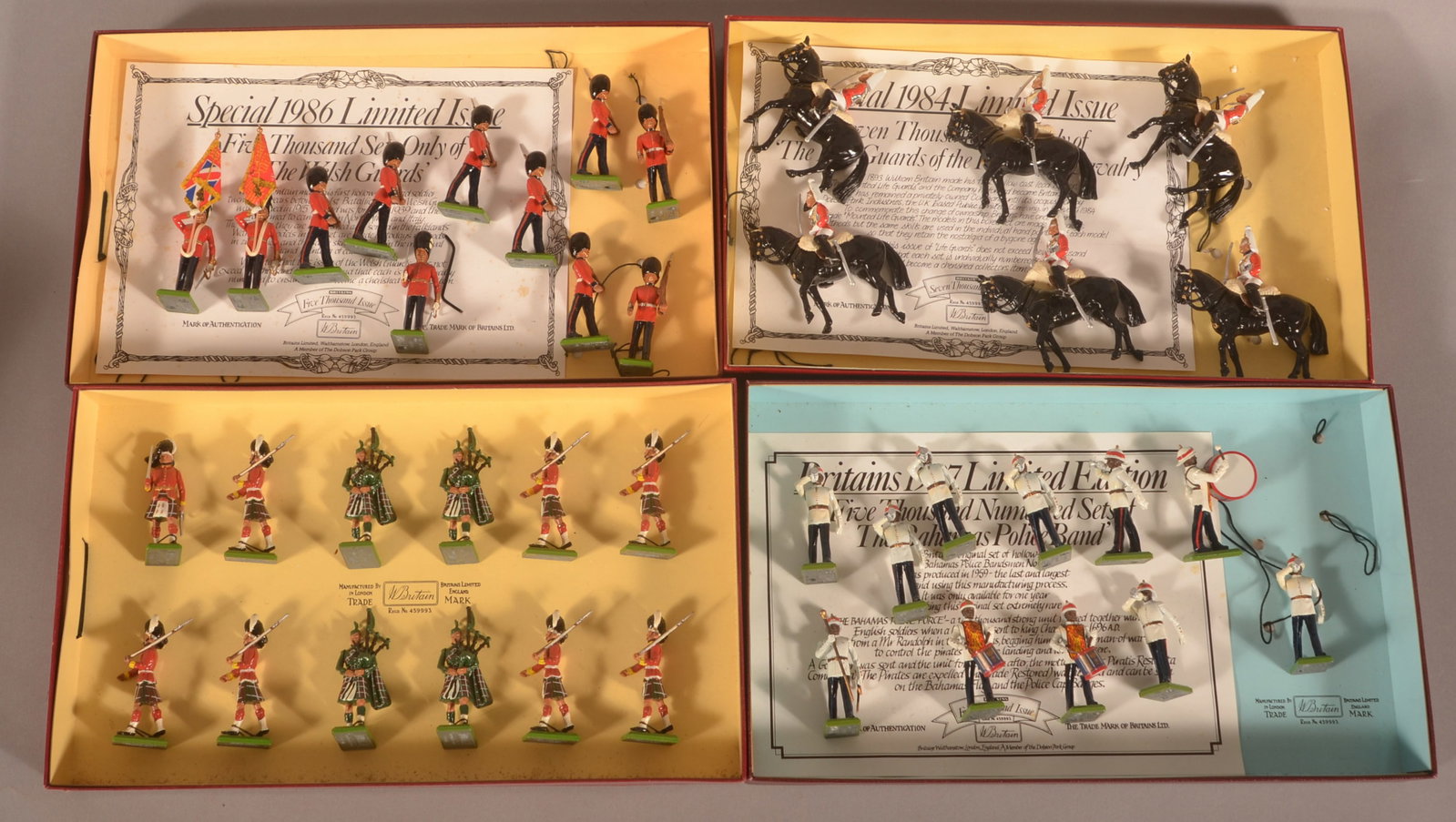 4 Sets Britain Limited Edition Lead Toy Soldiers: No. 5184 British Soldiers Lifeguards (Box # 2302), No. 5185 British Soldiers Seaforth Highlanders (Box #0354), No. 5186 British Soldiers Guards with cloth flags (Box #0441) and No. 5187 The Bahamas Po