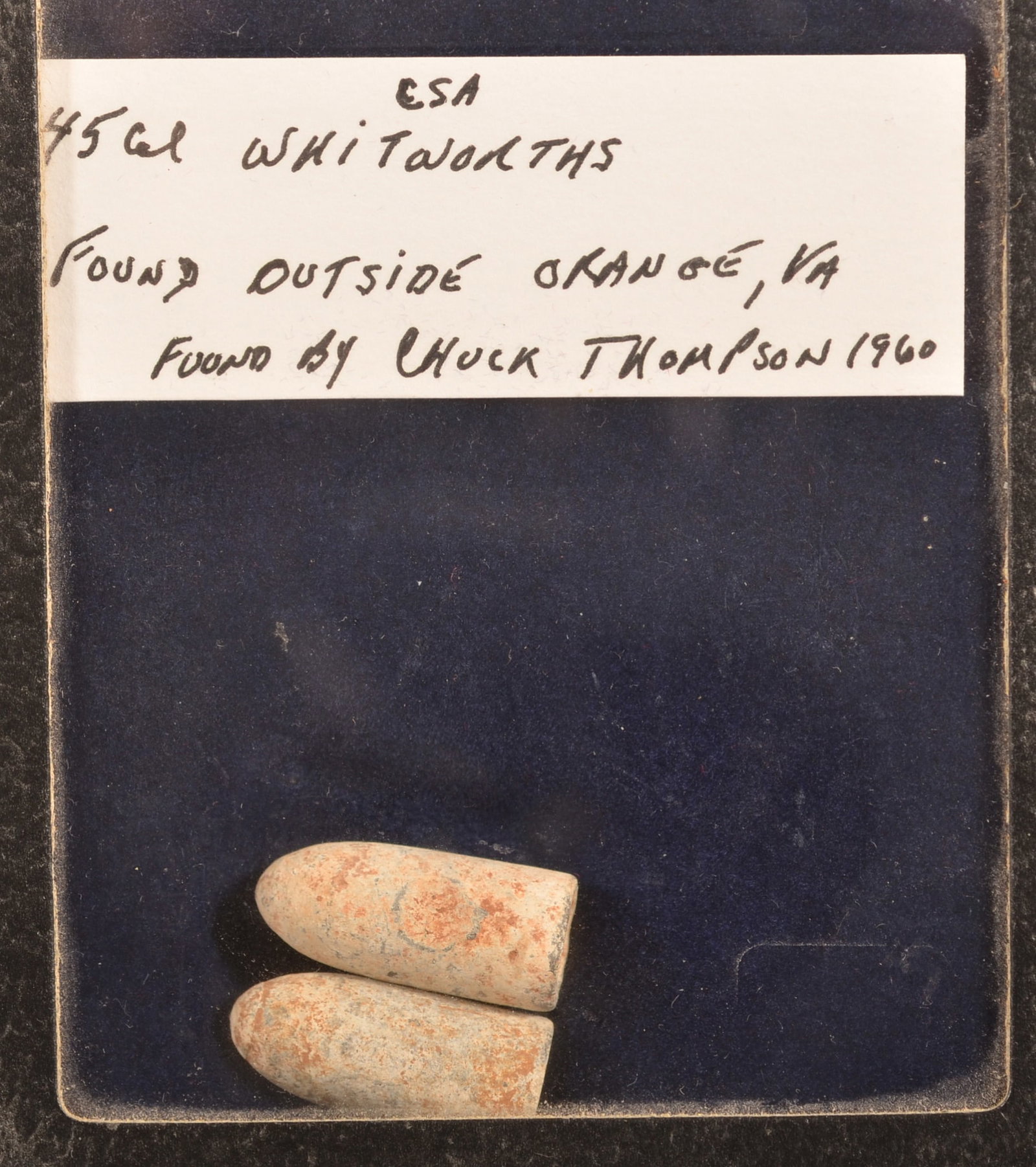 2 Recovered Confederate Whitworth Bullets: Consignor has noted that they were recovered outside of Orange Virginia by Chuck Thompson 1960. As-found dug, relic condition.