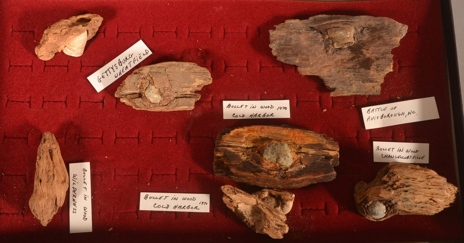 Riker Mount of Relic Bullets in Wood: As-found recovered condition.