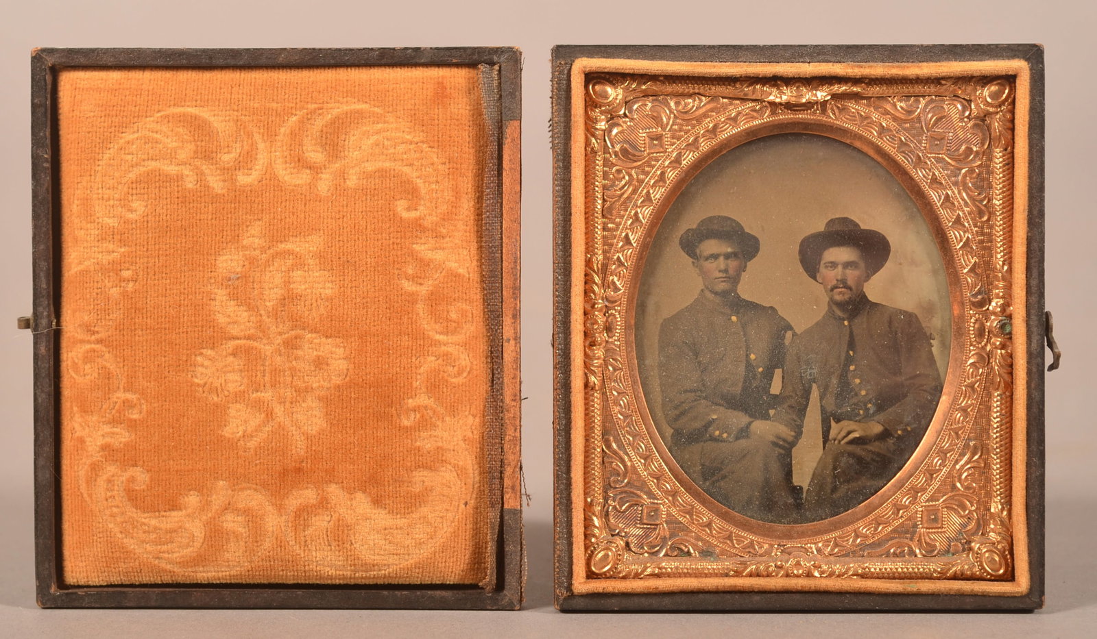 1/6th Cased Tintype of Two Union Seated Soldiers.: Clear image of two seated soldiers in full uniform, separated case cover with color fading and normal wear.