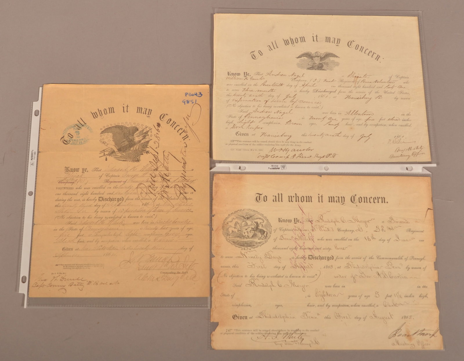 3 Civil War Discharge Papers: Age discoloration, color-fading and normal, expected wear.