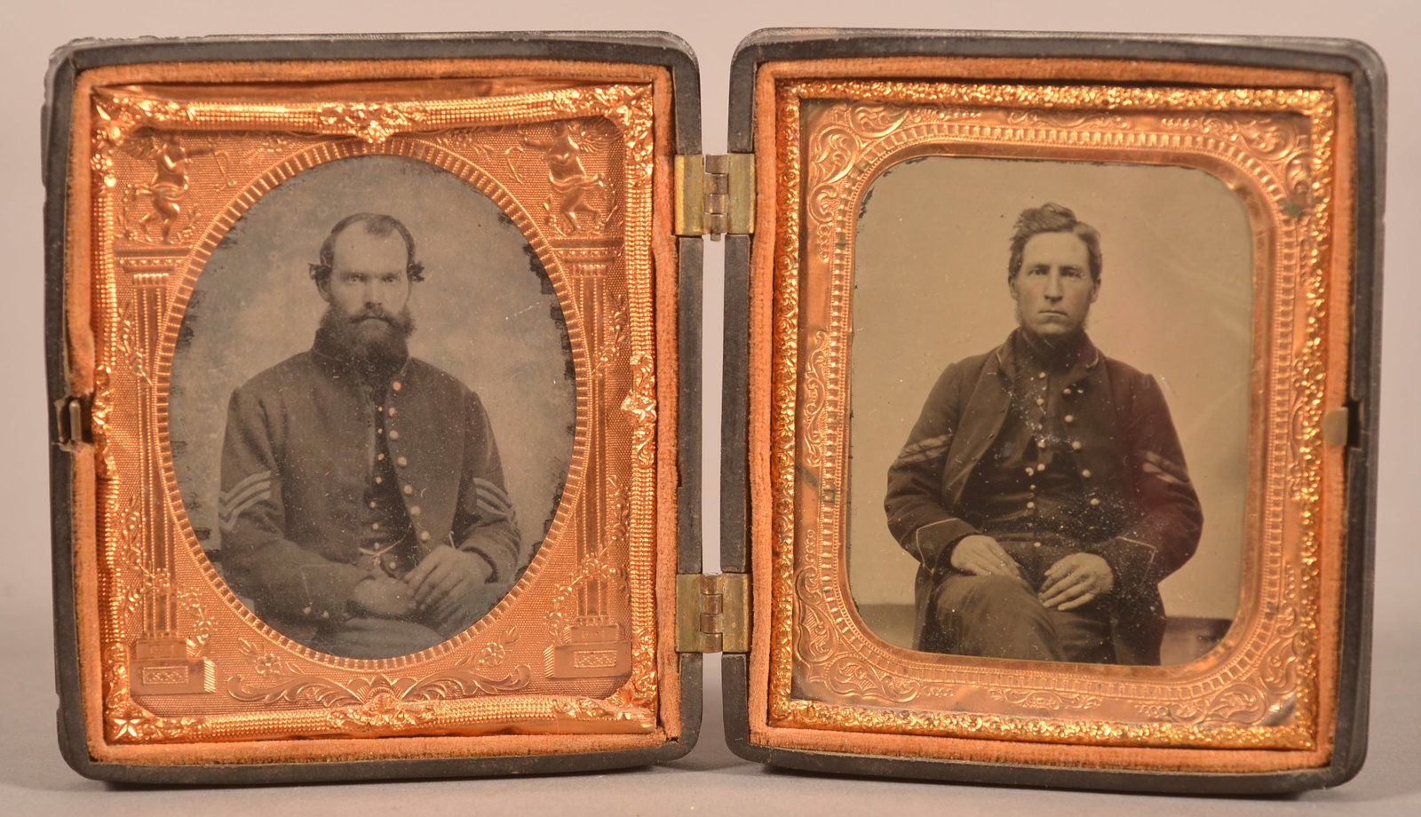 (2) 1/6th Cased Tintypes of Union Soldiers: Shows clear images of seated soldiers dressed in full uniform, plates show areas of blistering and image loss around the outer edges, expected finish and age wear to the case, overall good condition c