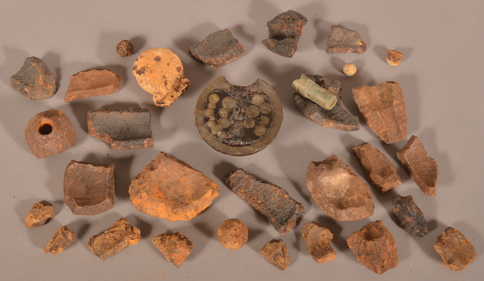 Assortment of Recovered Artillery Fragments: As-found, dug, recovered condition.