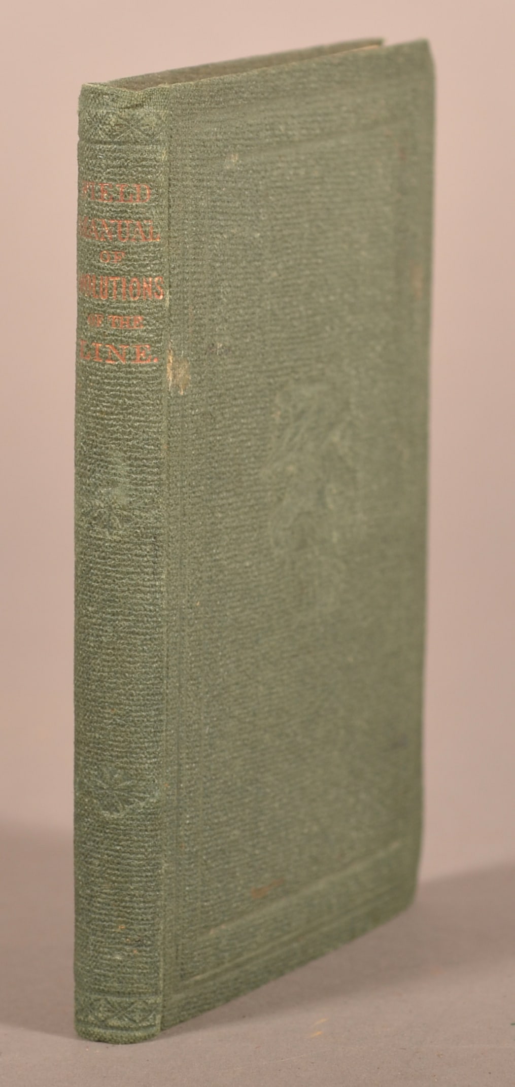 1862 Field Manual Evolutions of the Line: Inside has a mark identifying it as property of the Commonwealth of Massachusetts. Color fading due to age with expected wear, speckled staining to the pages with normal signs of age, overall fair con