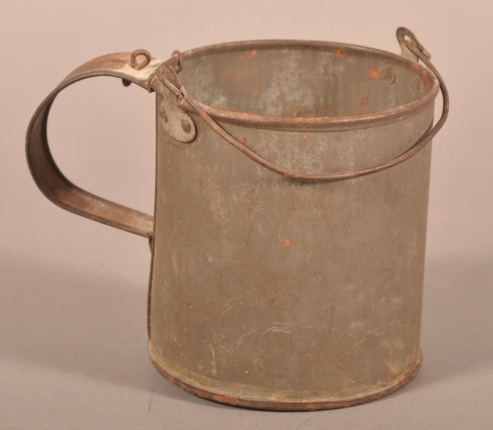 Civil War Era Tin Cup: 4-1/2" tall with a wire-form bail handle, expected oxidation and signs of age, overall fair condition.