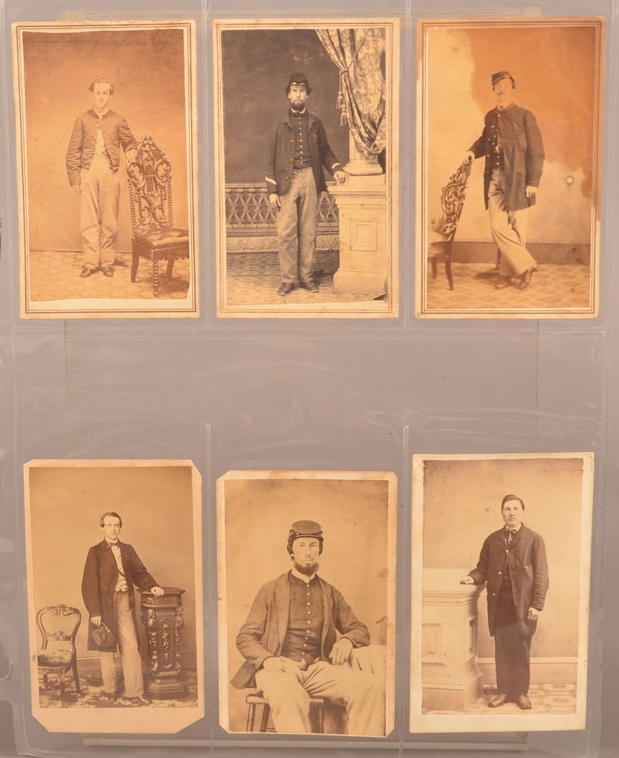 6 CDV's of Union Soldiers: Dressed in full uniforms with one card of a man in civilians clothes, backmarked for Pa. photographers, one card is showing water staining, clear images with normal color toning, overall fair to good 