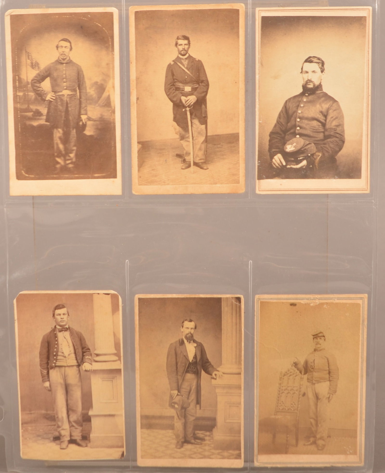 6 CDV's of Union Soldiers: Dressed in full uniforms, backmarked with assorted Pa. photographers, one card is hand written "David S. Seibert Capt. Co. D 48th Pa. Militia 1863", clear images with color toning and minor loss, over
