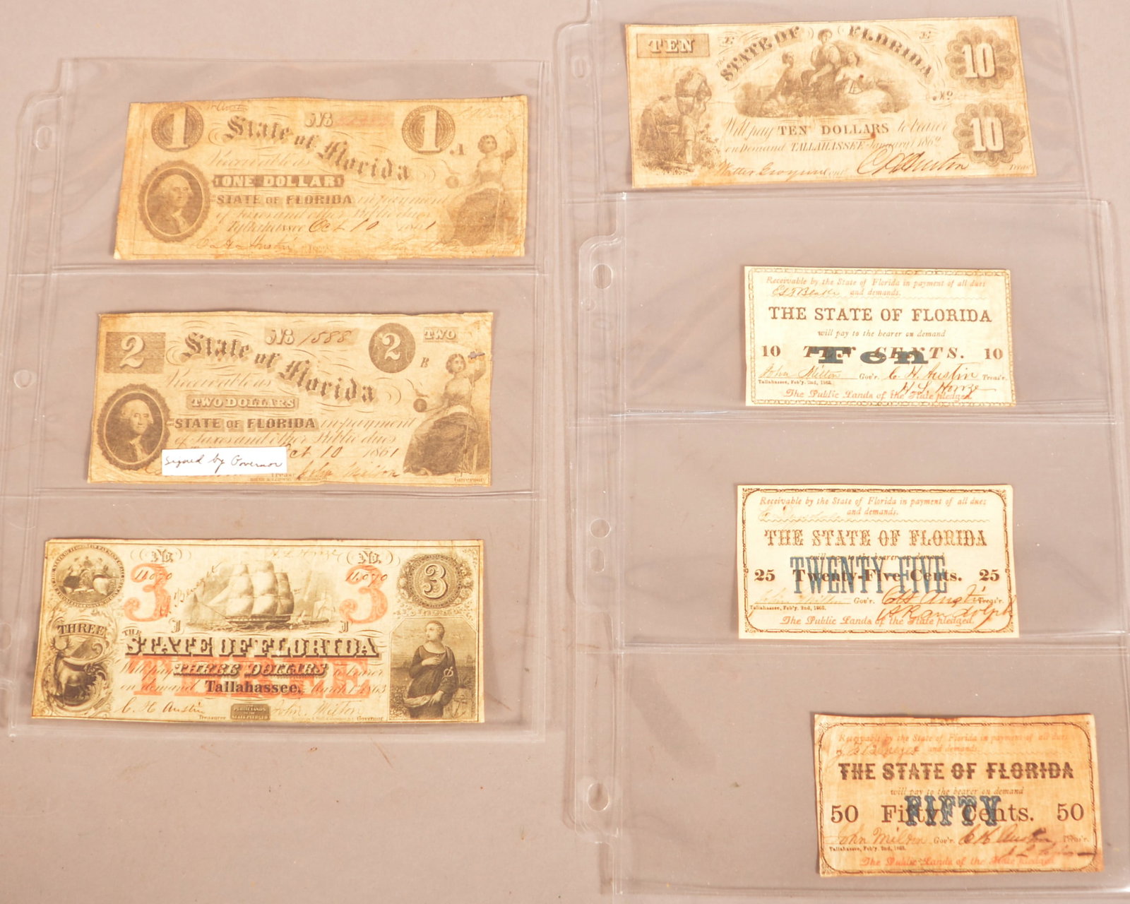 7 Confederate Florida Banknotes: Expected color toning and age discoloration, shows small creases and folds, minor loss around the edges, overall fair condition.