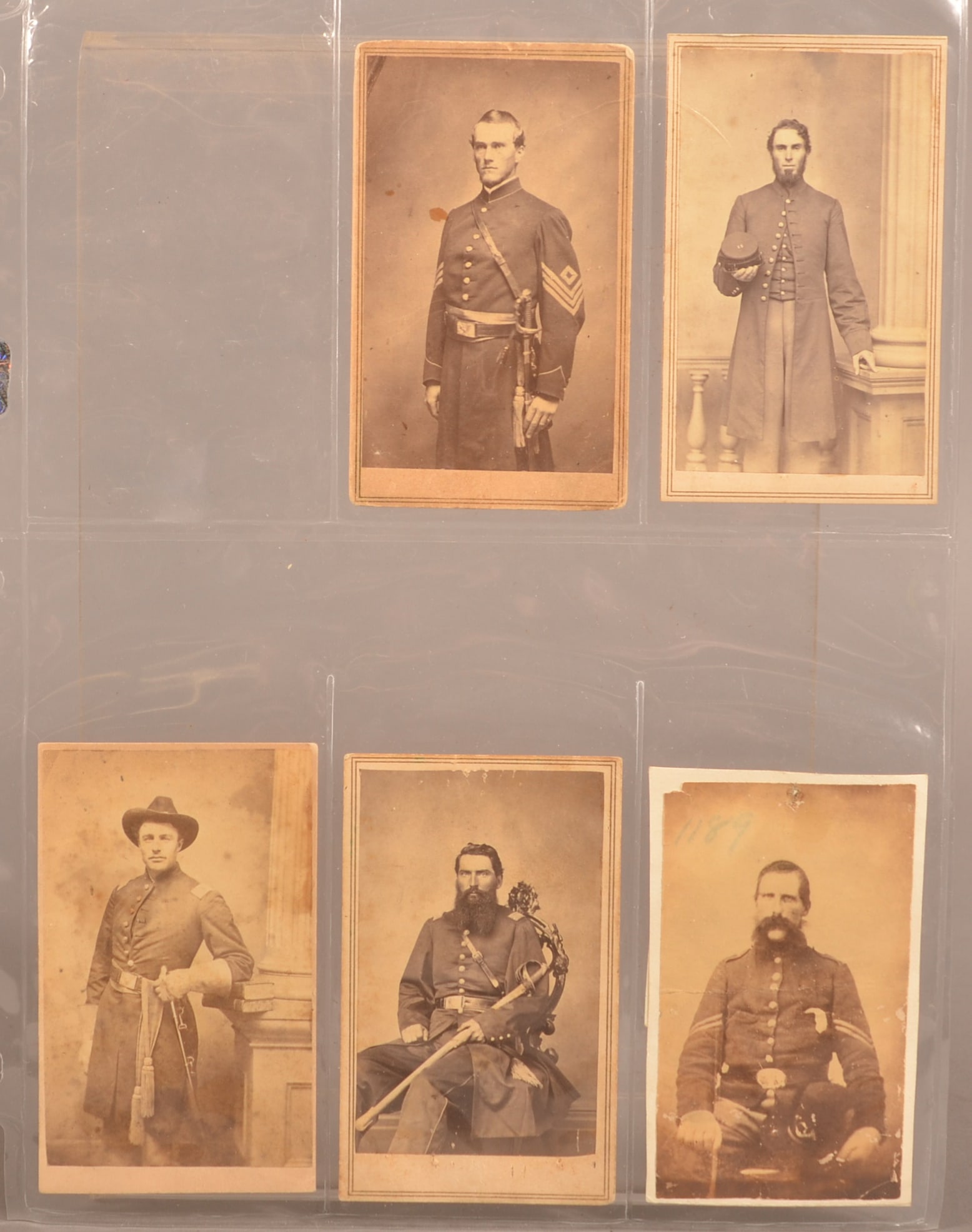 5 CDV's of Union Soldiers: One card is handwritten as a member of the 13th New Hampshire Infantry, the other has a later-applied backing being identified as Sgt. Joseph Wagner of Co. H 33rd Regt. oy N.Y Volunteers, normal color