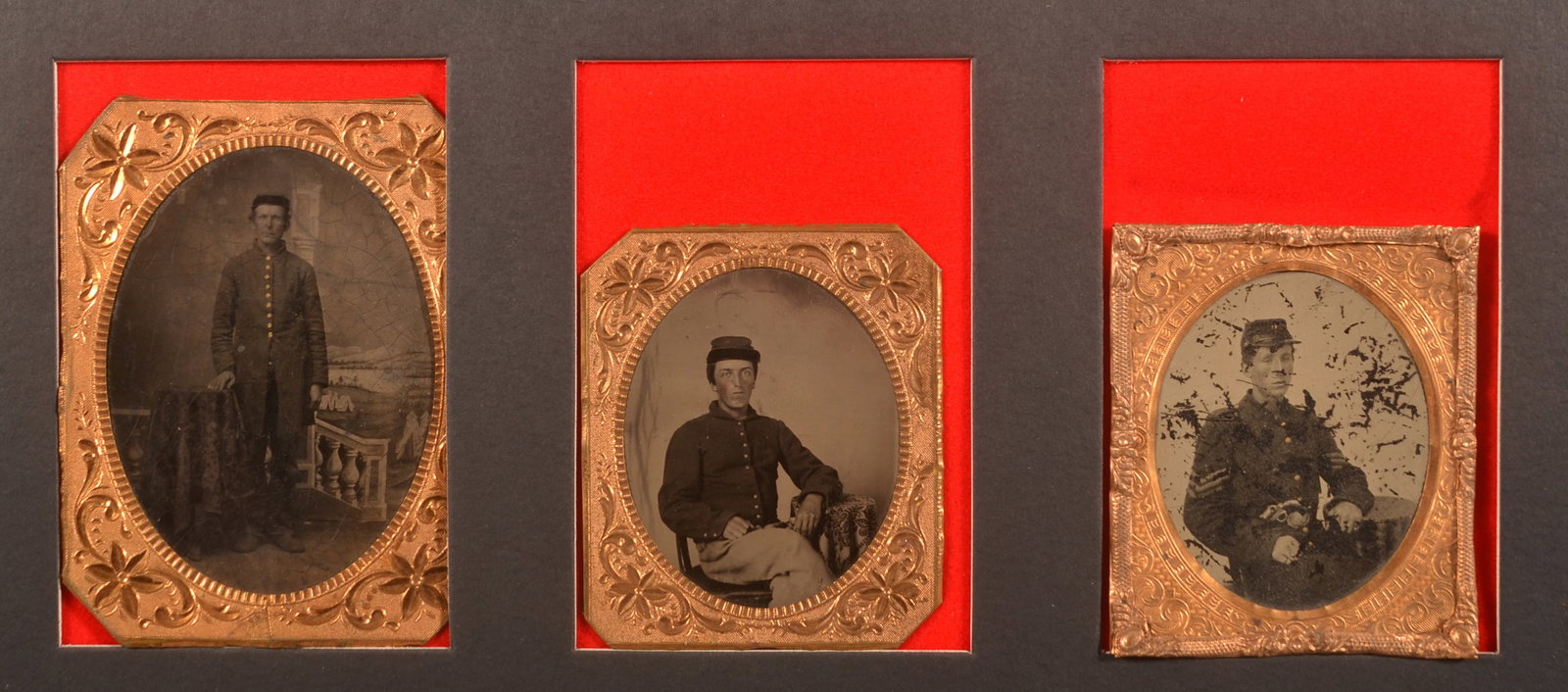 (3) 1/6th and 1/9th Cased Union Soldier Tintypes: One image is of a seated soldier with a single action Army revolver in his holster wearing full uniform with sergeant stripes, that image has heavy finish scratches with image loss, the other two are 
