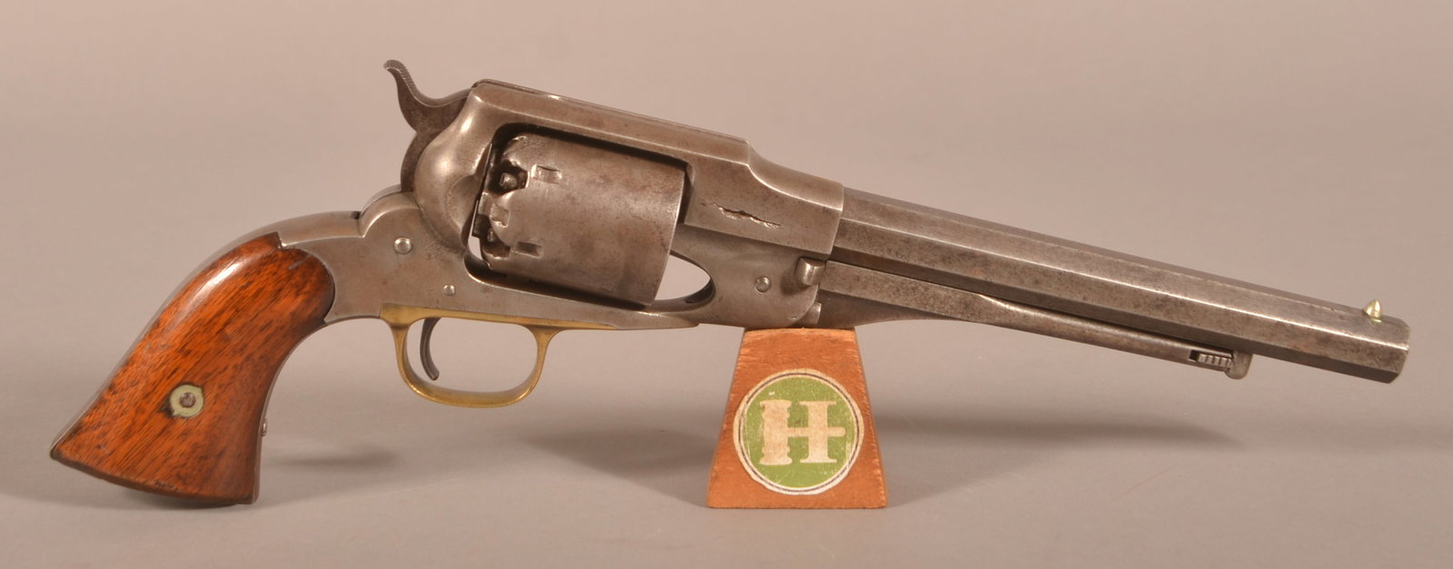 Remington-Beals Pat. mod. 1861 Perc. Revolver: SN 1557, .44 cal., 8" octagon barrel marked with 2-line name and Beals patent date, serial number is stamped on the barrel under the load lever, "PJ" inspector's mark on the cylinder, brass trigger gu