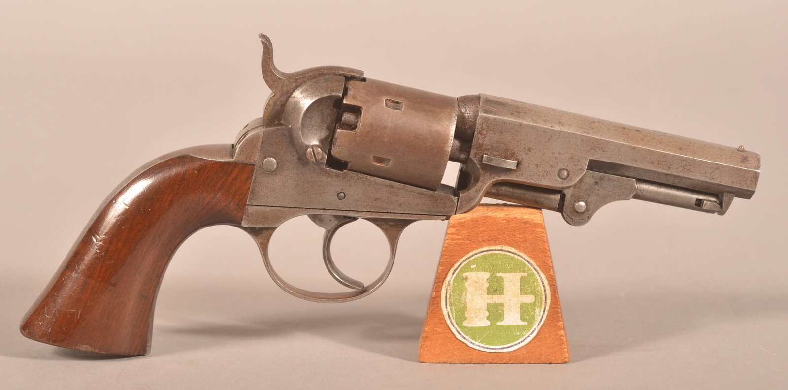J.M. Cooper .31 cal. Pocket Revolver: SN 1323, 4" octagon barrel with 3-line company markings including "FRANKFORD PHILA. PA", iron backstrap with matching numbers on the heel and trigger guard, original appearing smooth walnut grip panel