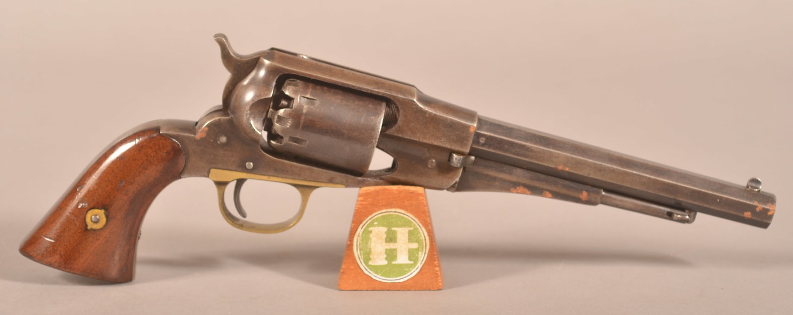 Remington New Model 1858 .44 cal. Perc. Revolver: SN 32501, 7-1/2" barrel with the top flat having 3-line name and address with "NEW MODEL", correct-working action, brass trigger guard, various sub inspectors marks, faded, aged worn finish with mostl