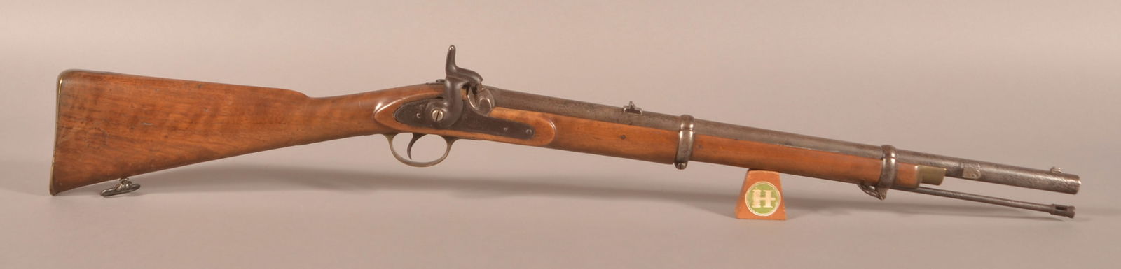 Enfield Pattern 1853 .577 cal. Cavalry Carbine: NSF, 24" round barrel with standard British markings and bayonet lug, lockplate dated 1861 stamped "Tower", loss to the stock around the lockplate, stock appears to have an older refinishing, excessiv