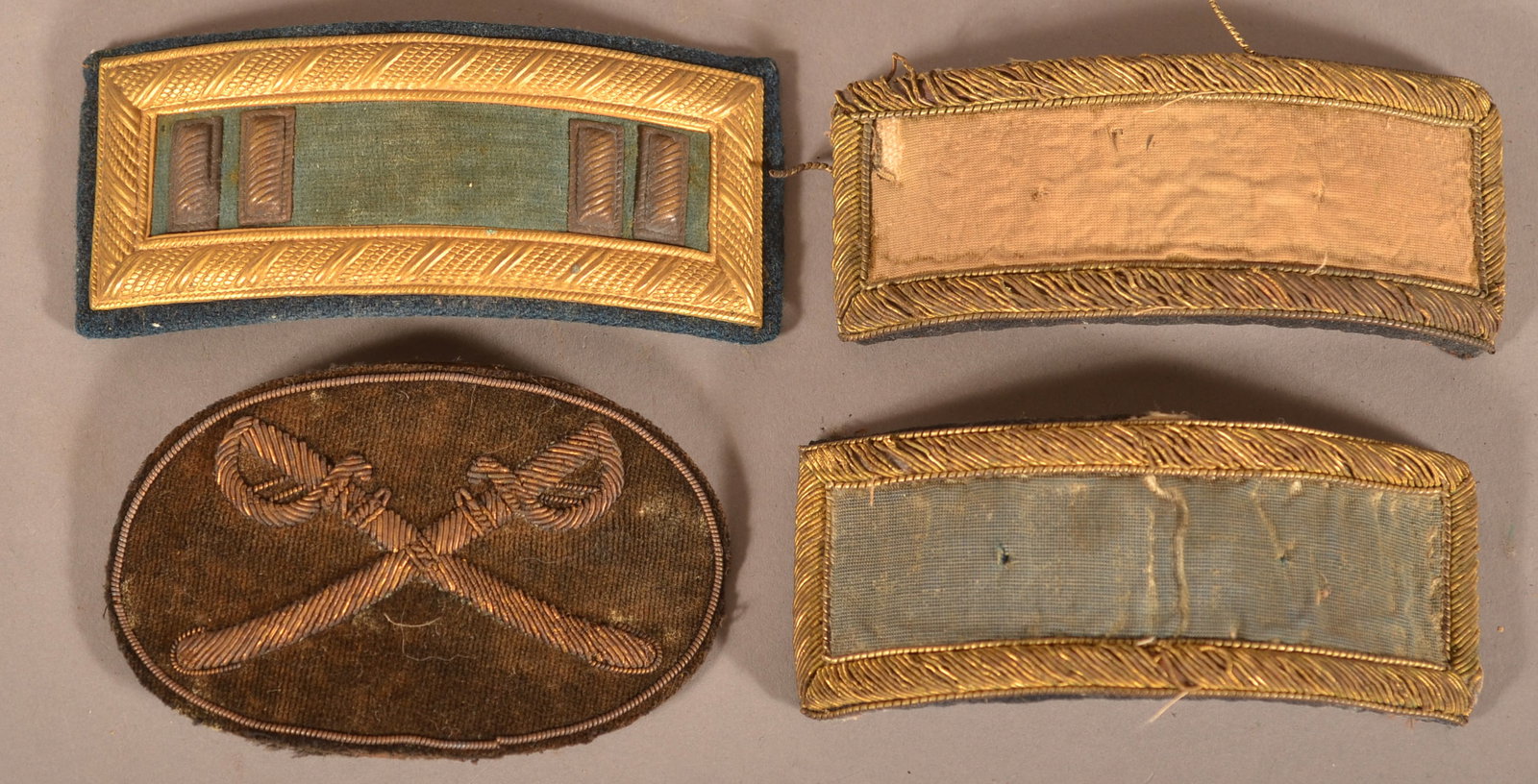 3 Shoulder Boards with Hat Badge: As-found, removed condition with age discoloration and wear, overall fair condition.