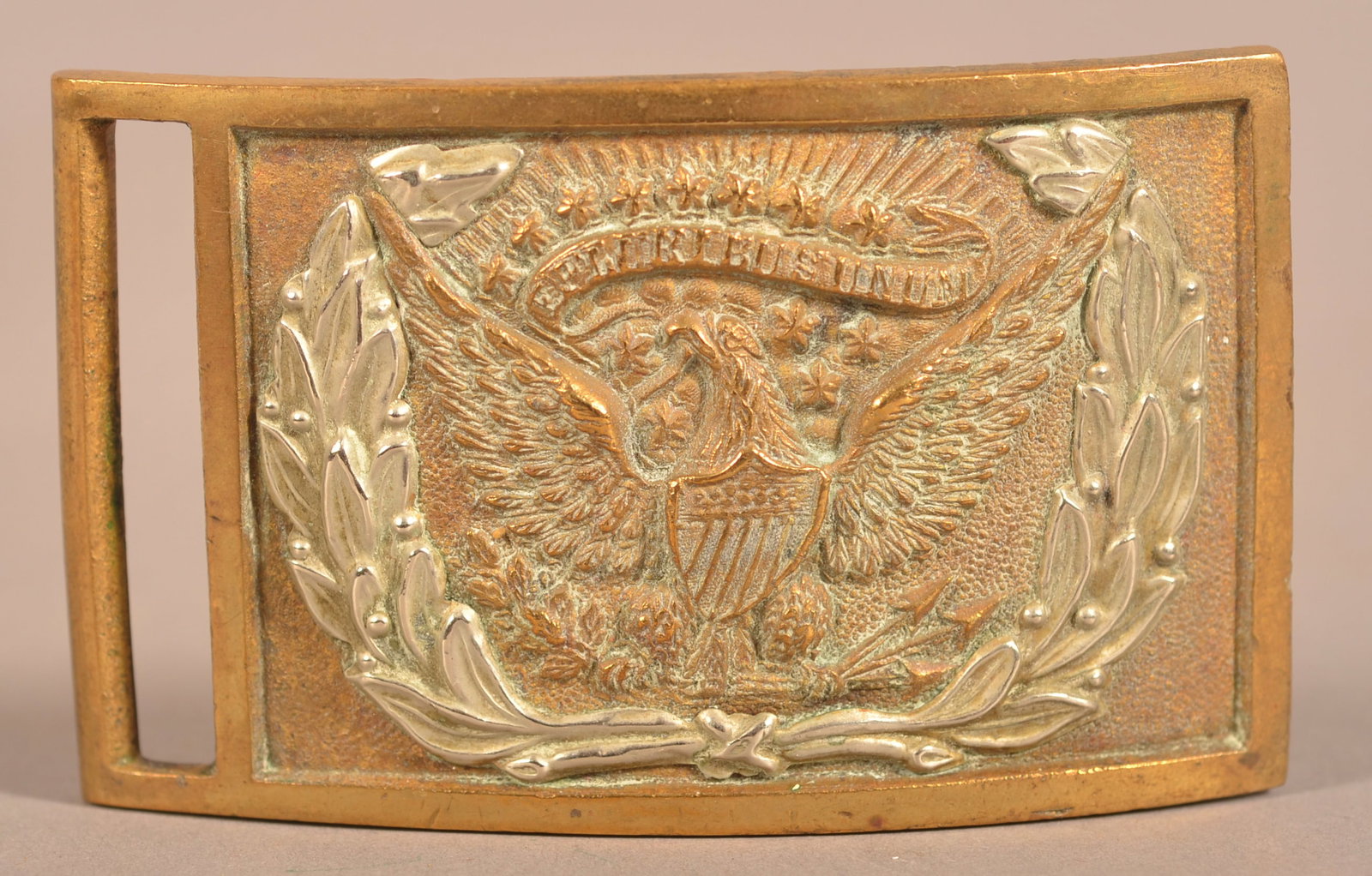 Pattern 1851 Sword Belt Plate: Cast brass construction with belt loop and tongue, "262" benchmark appearing on the reverse side, silver plated wreath with light strike marks appearing around the edge, appears to have a later-applie