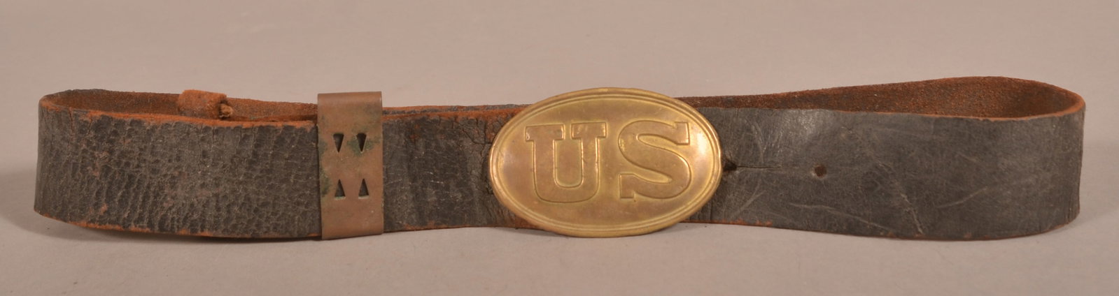 US Pattern 1839 Belt Plate with Belt: Die-struck rolled brass construction with lead filled back, original arrow attachment hooks, no Visible makers mark, normal strike marks and wear to the face of the buckle, dry, aged leather belt that