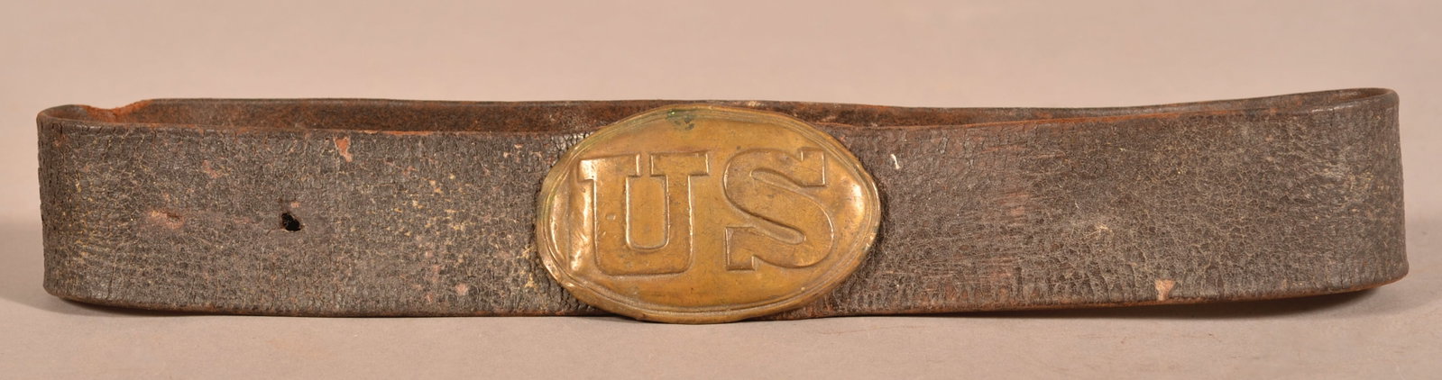 1839 Pattern Belt Plate with Belt: One of the two letter styles associated with non regulation plates, die struck crudely fashioned with distorted letter "S", lead filled back with puppy-paw style attachments, plate shows a distorted p