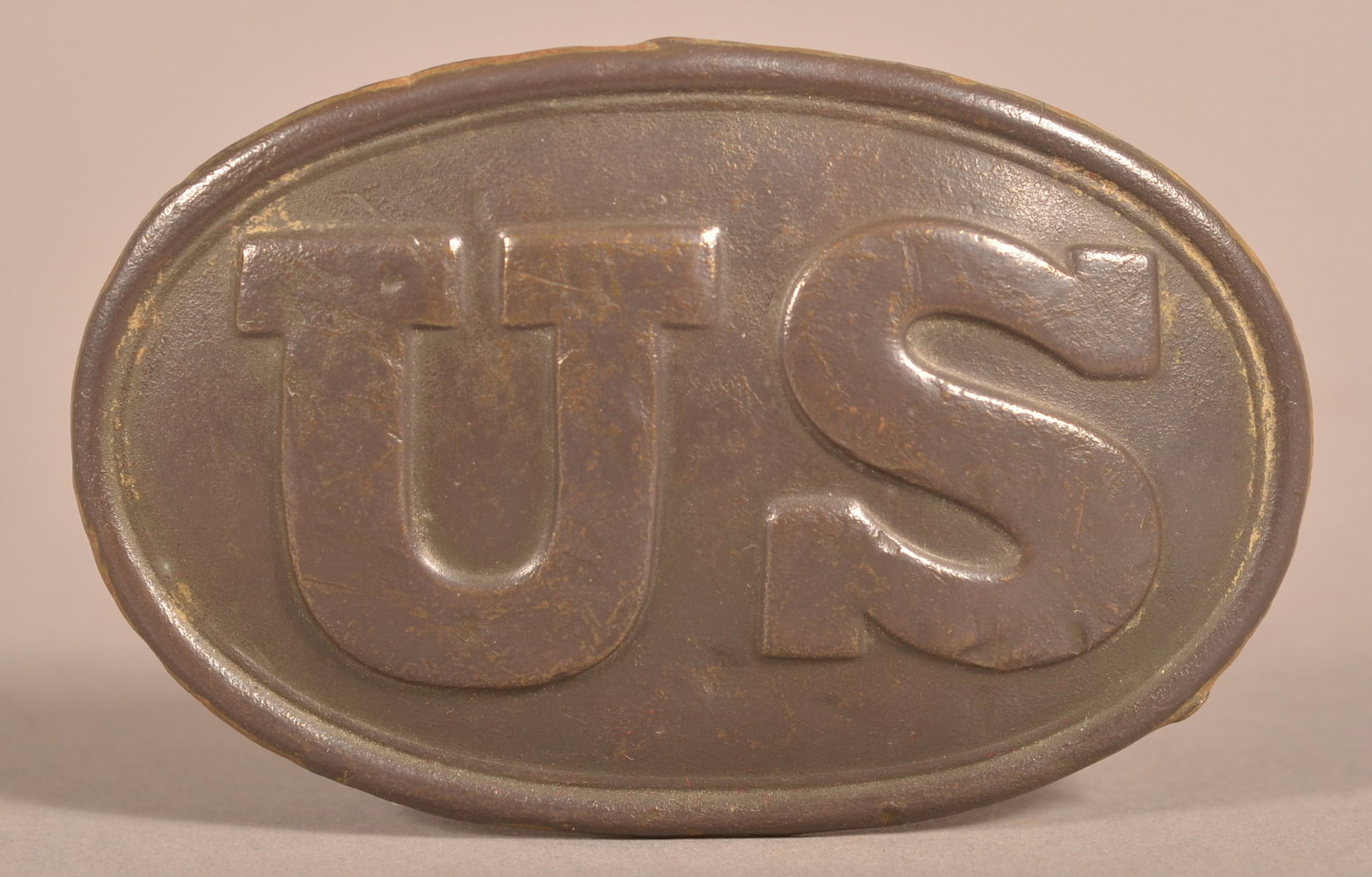 W.H. Smith Pattern 1839 Puppy Paw Belt Plate: Visible makers mark on the lead filled back, cleaned brass construction, as-found dug, relic condition.