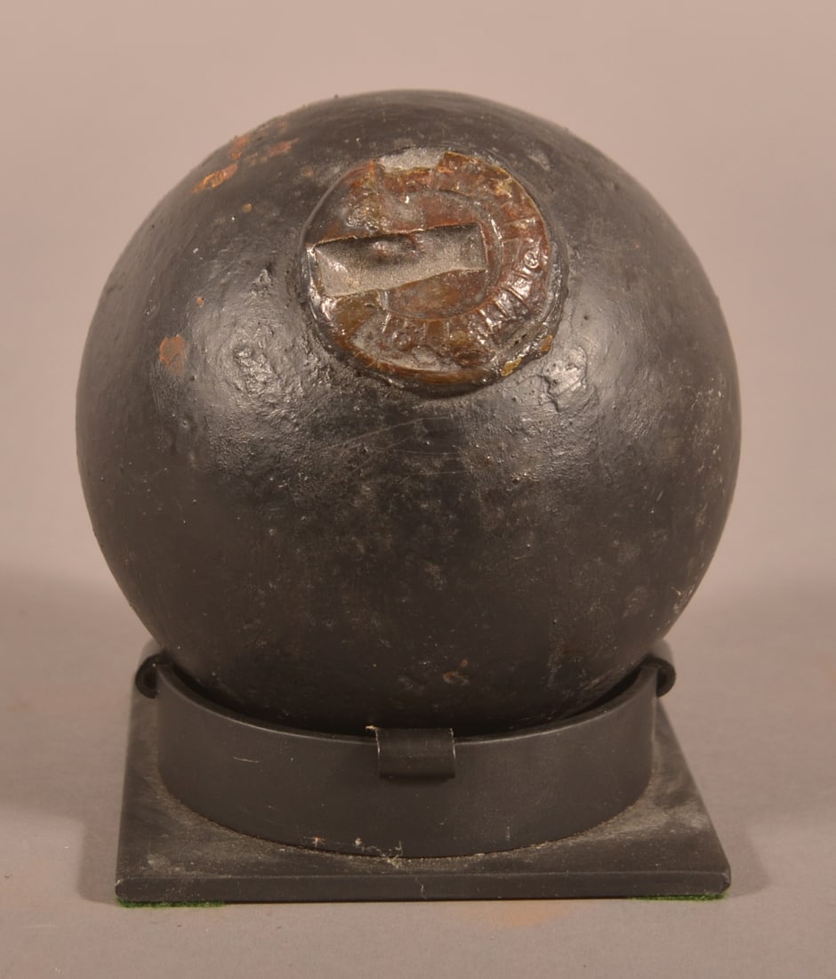 8lb Cannonball with Bormann Fuse: Ball has been drilled, worn deteriorated fuse, later-applied black painted finish, unsure if it was a dug relic.