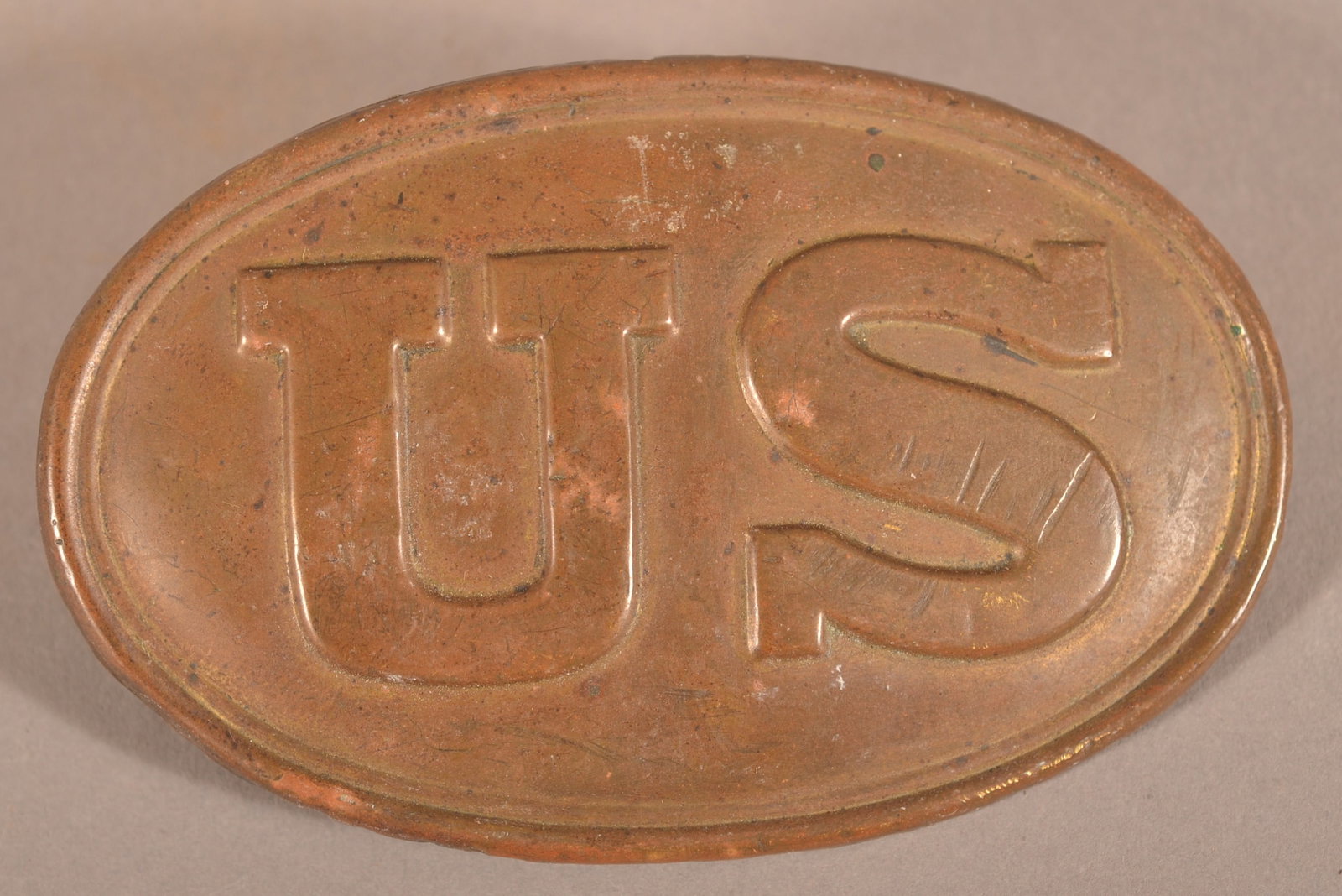 Pattern 1839 Regulation Belt Plate: Unmarked with a lead-filled back with arrow attachment hooks, overall fair condition with strike marks to the face.