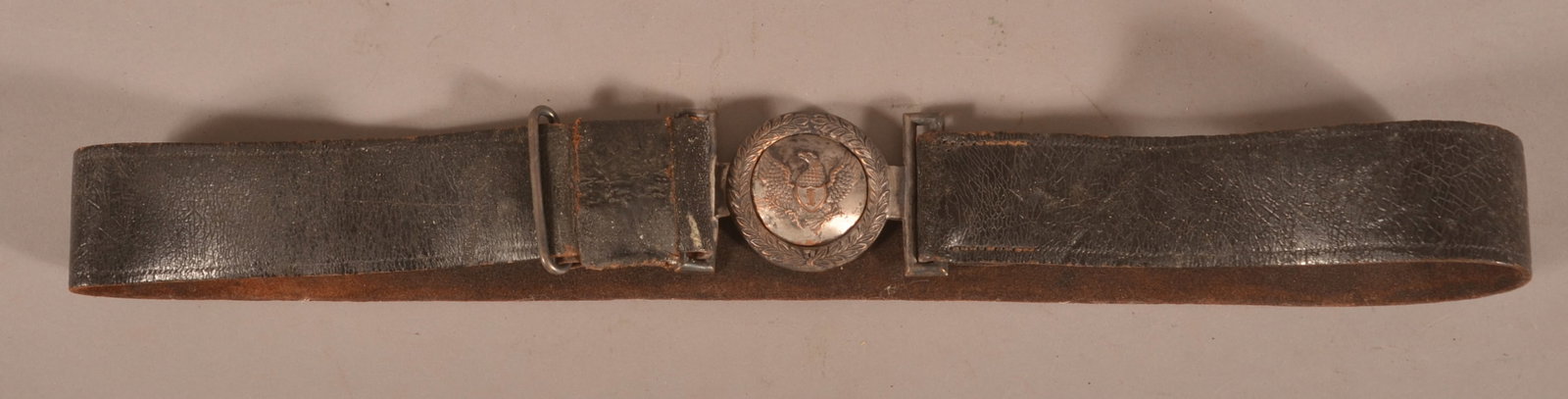 Militia Belt Plate with Waist Belt: Stamped steel-plated construction with two #6 benchmarks, expected plating loss and tarnish, waist belt shows age cracks and crazing with scuff marks and flaking, overall fair condition.