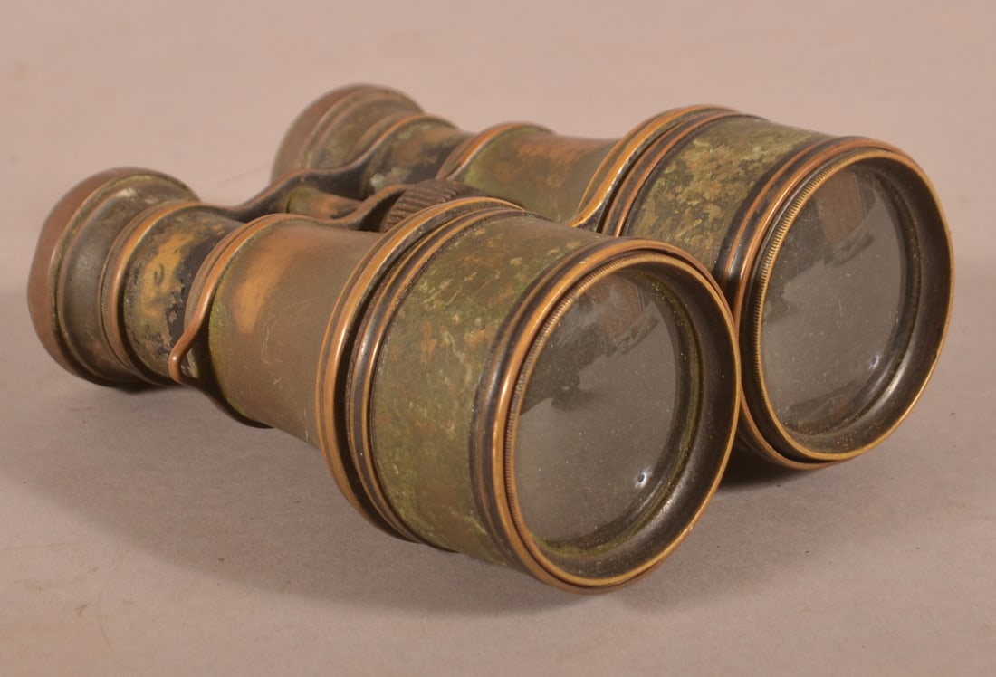 Unmarked Civil War Era Field Glasses: Brass construction with clear optics, intact adjustable sun shades that are loose fitting, exterior finish has worn and faded away exposing brass, faded, aged, worn, and untouched finish, overall fair