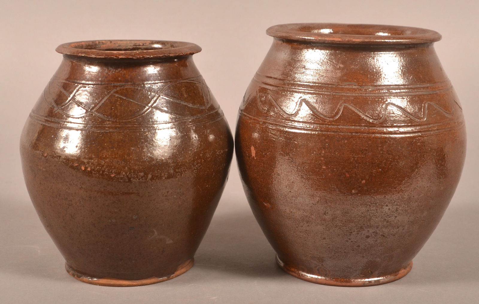 Two Bulbous-Form Glazed Redware Storage Jars. (1 of 3)