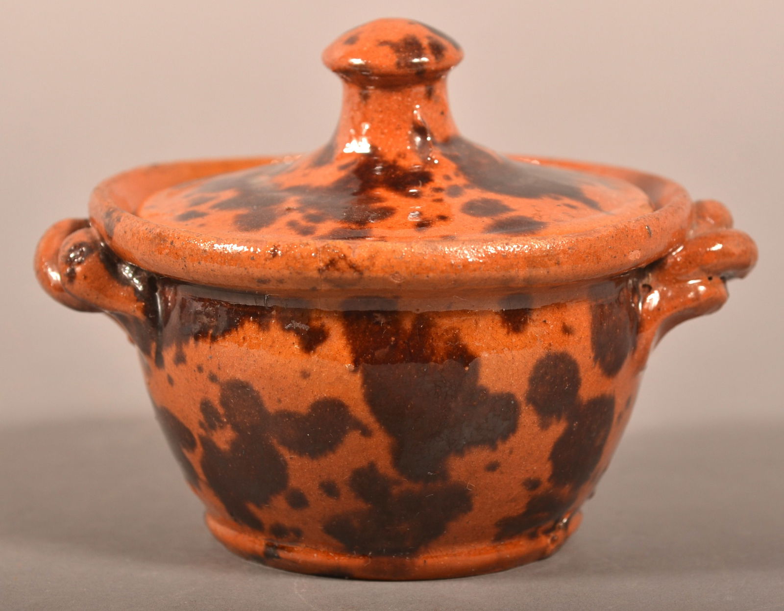 PA 19th C. Mottled Glaze Redware Sugar Bowl.: Pennsylvania 19th Century Mottled Glaze Redware Small Covered Sugar Bowl. 3-1/2"h. x 4" diam.
