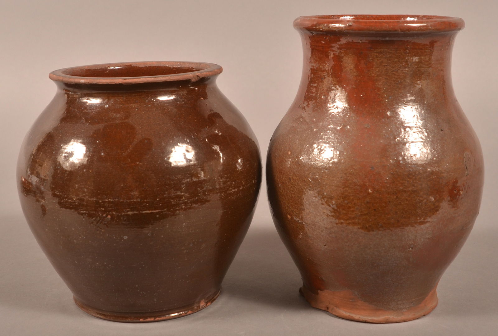 Two 19th Century Glazed Redware Storage Jars. (1 of 3)