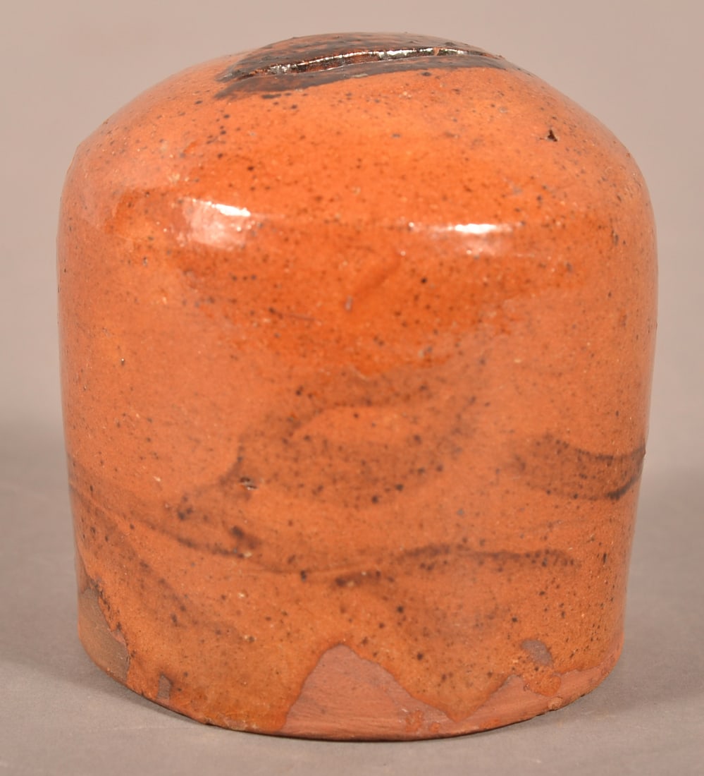 Pennsylvania Glazed Redware Dome-Form Still Bank.: Pennsylvania Glazed Redware Dome-Form Still Bank. Manganese brushed trailing flower decoration. 3"h.