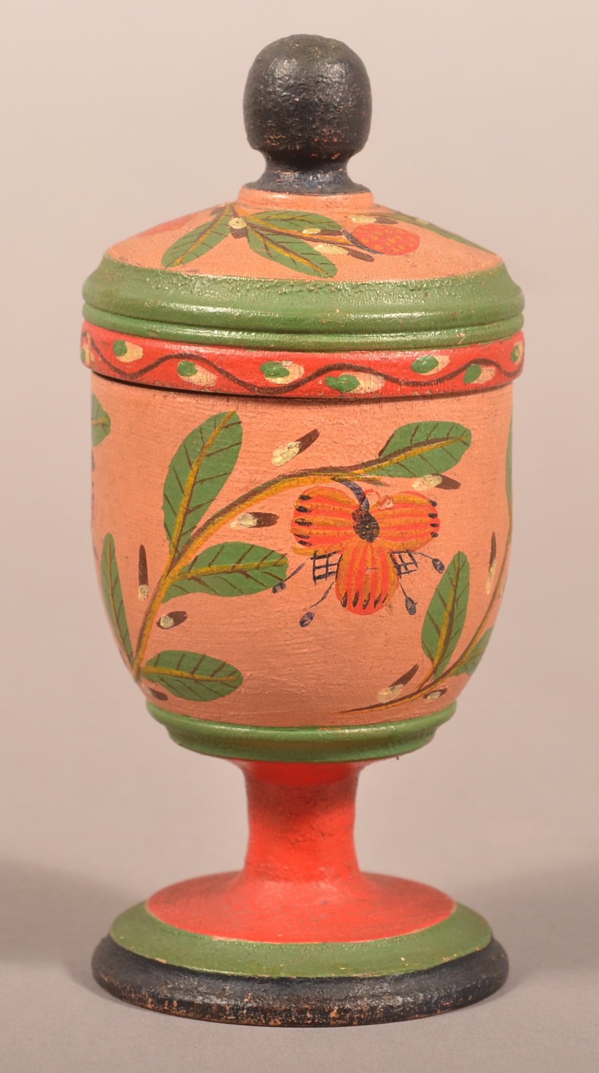Covered Lehnware Footed Saffron Cup.: Covered Lehnware Footed Saffron Cup. Joseph Long Lehn (1798-1892), Clay Township, Lancaster County, Pennsylvania. Turned poplar wood, blue, green and red pedestal base, salmon body with three floral a