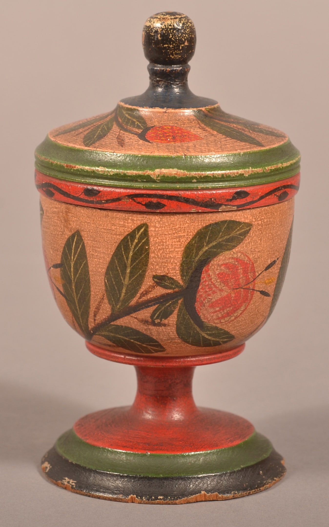 Covered Lehnware Footed Saffron Cup.: Covered Lehnware Footed Saffron Cup. Joseph Long Lehn (1798-1892), Clay Township, Lancaster County, PA. Turned poplar wood, scarce tan ground with three pomegranate and foliate sprays, lid with three
