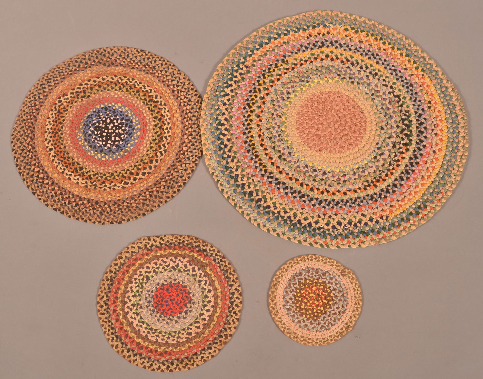 Four Antique Hand-Braided Round Table Mats. (1 of 2)