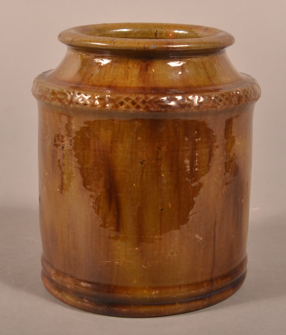 PA 19th C. Mottled Glaze Redware Storage Jar.: Pennsylvania 19th Century Green Mottled Glaze Redware Storage Jar. Semi-round rim, raised molded shoulder, straight sides, and molded base. 5-1/4"h.