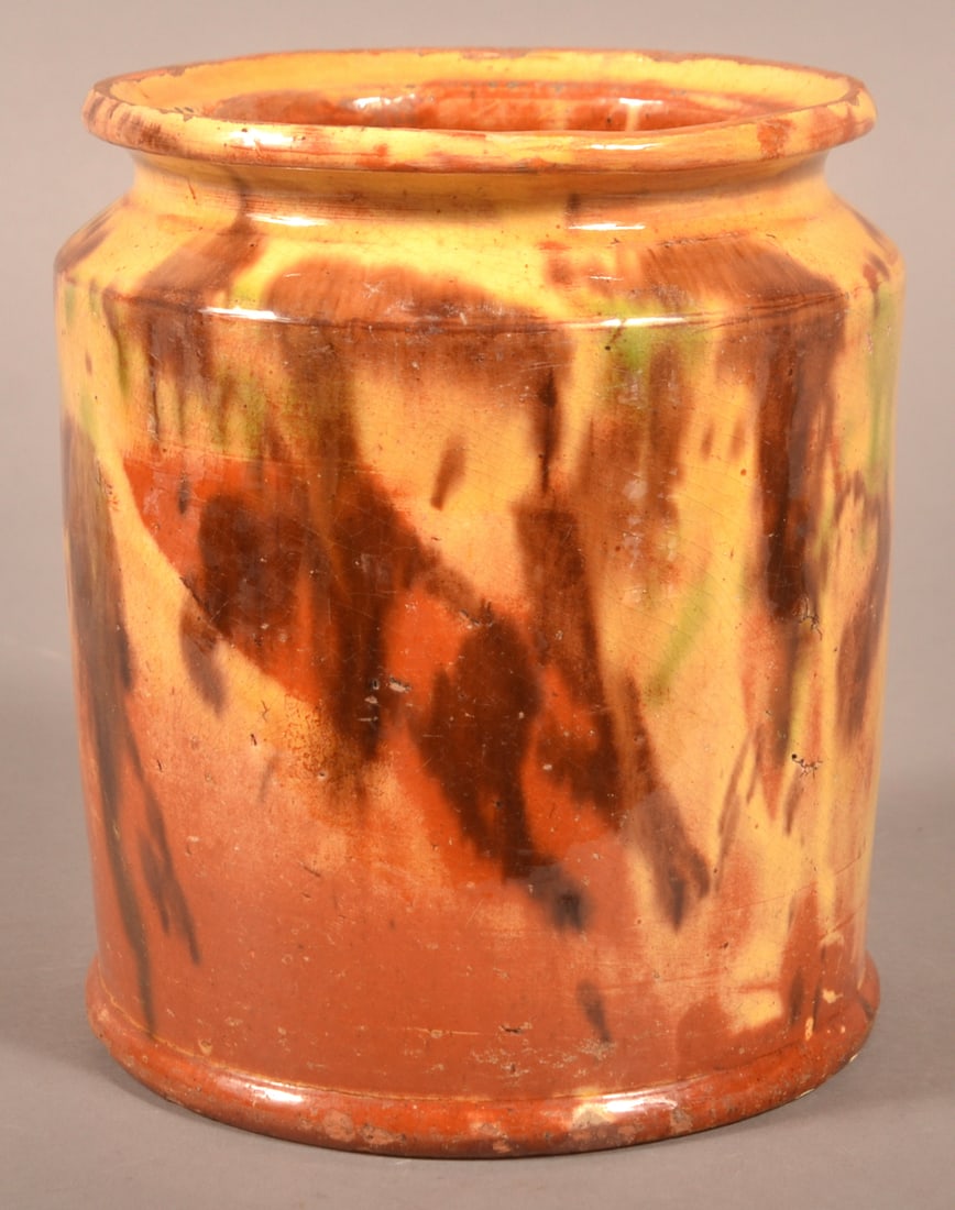 Shenandoah Valley Glazed Redware Storage Jar.: Shenandoah Valley Polychrome Mottled Glaze Redware Pottery Storage Jar. Attributed to J. Eberly & Co. Strasburg, VA, ca. 1885-1899. Flared rim, straight-sided vessel. 8"h.