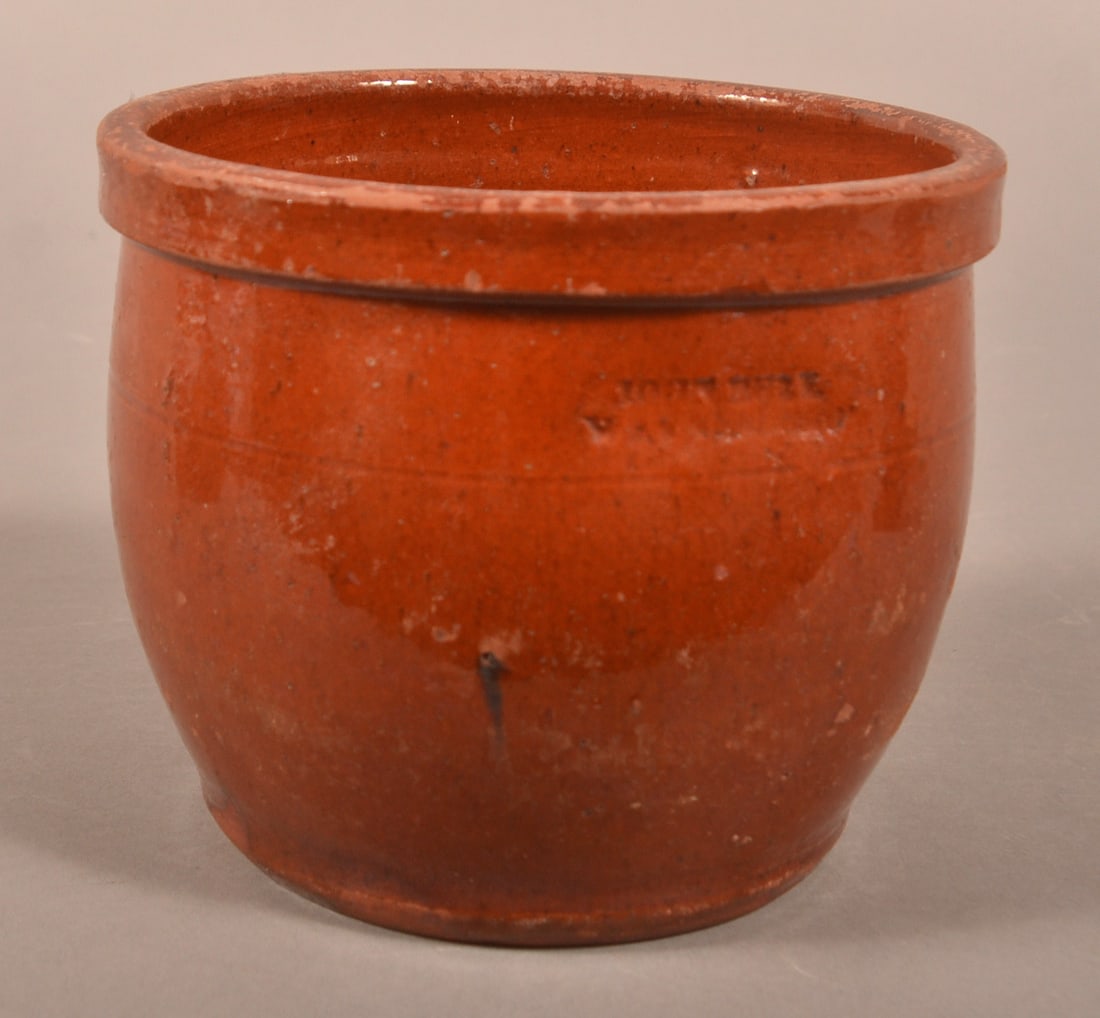John Bell, Waynesboro, PA 19th C. Redware Jar.: John Bell, Waynesboro, PA 19th Century Glazed Redware Storage Jar. Square molded rim, tooled shoulder, and bulbous body. 4-7/8"h.