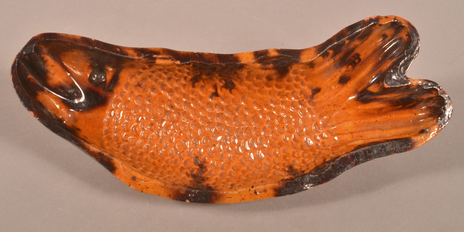 Willoughby Smith Glazed Redware Fish Mold.: Willoughby Smith, Womelsdorf, PA Mottled Glaze Redware Fish Mold. (Berks Co., PA, ca. 1865-1880.) Provenance: Purchased at Lester Breininger Onsite Auction, Robesonia, PA March 21, 2015, sold by Hess