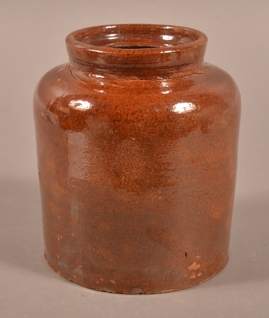 Pennsylvania Glazed Redware Storage Jar.: Pennsylvania Glazed Redware Storage Jar. Incised on base, "D. Miller 1870". 6-1/2"h.