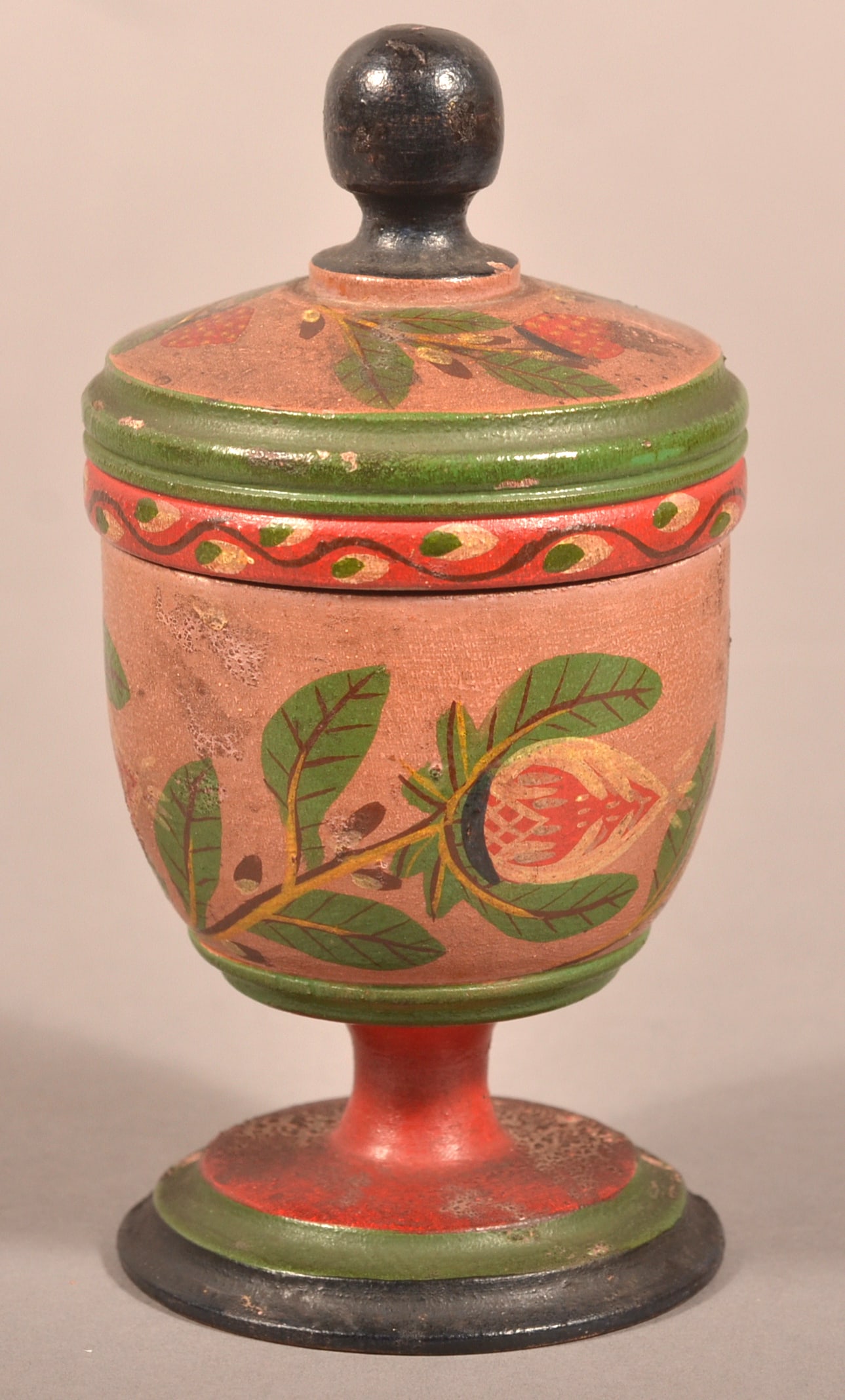Covered Lehnware Footed Saffron Cup.: Covered Lehnware Footed Saffron Cup. Joseph Long Lehn (1798-1892), Clay Township, Lancaster County, PA. Turned poplar wood, varnished salmon ground with three stylized strawberries, bud and foliate sp