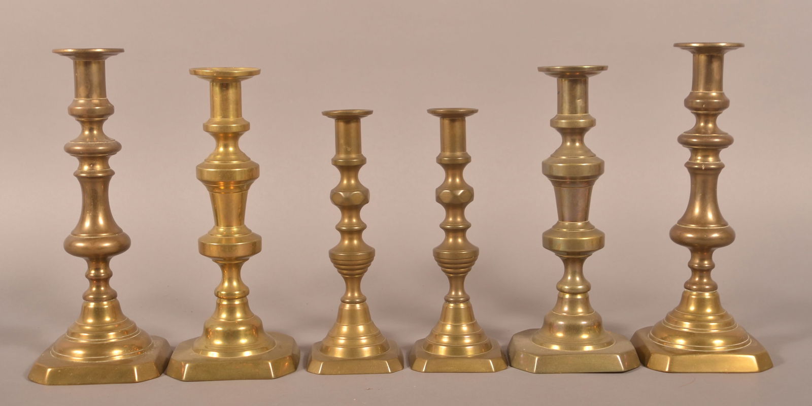 Three Pairs of 19th Century Brass Candlesticks. (1 of 3)