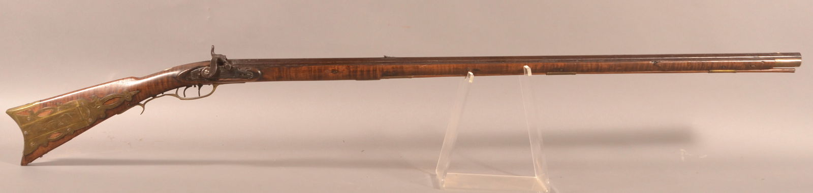 William Shuler PA Percussion Full-Stock Rifle.: William Shuler Pennsylvania Curly Maple Percussion Full-Stock Rifle. Brass furniture including an incised 4-piece patchbox. Double-set triggers. German silver spreadwing eagle engraved oval cheek-piec