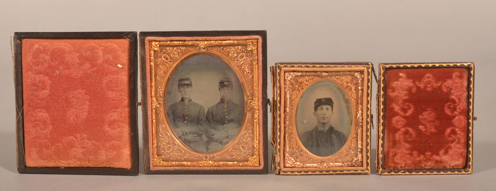 American Civil War Soldiers Ambrotype & Tintype.: American Civil War Soldiers Ambrotype and Tintype. Sixth-plate ambrotype of two Civil War soldiers (possibly brothers), seated pose in uniforms with kepis, in a leatherette case concealing a lock of h