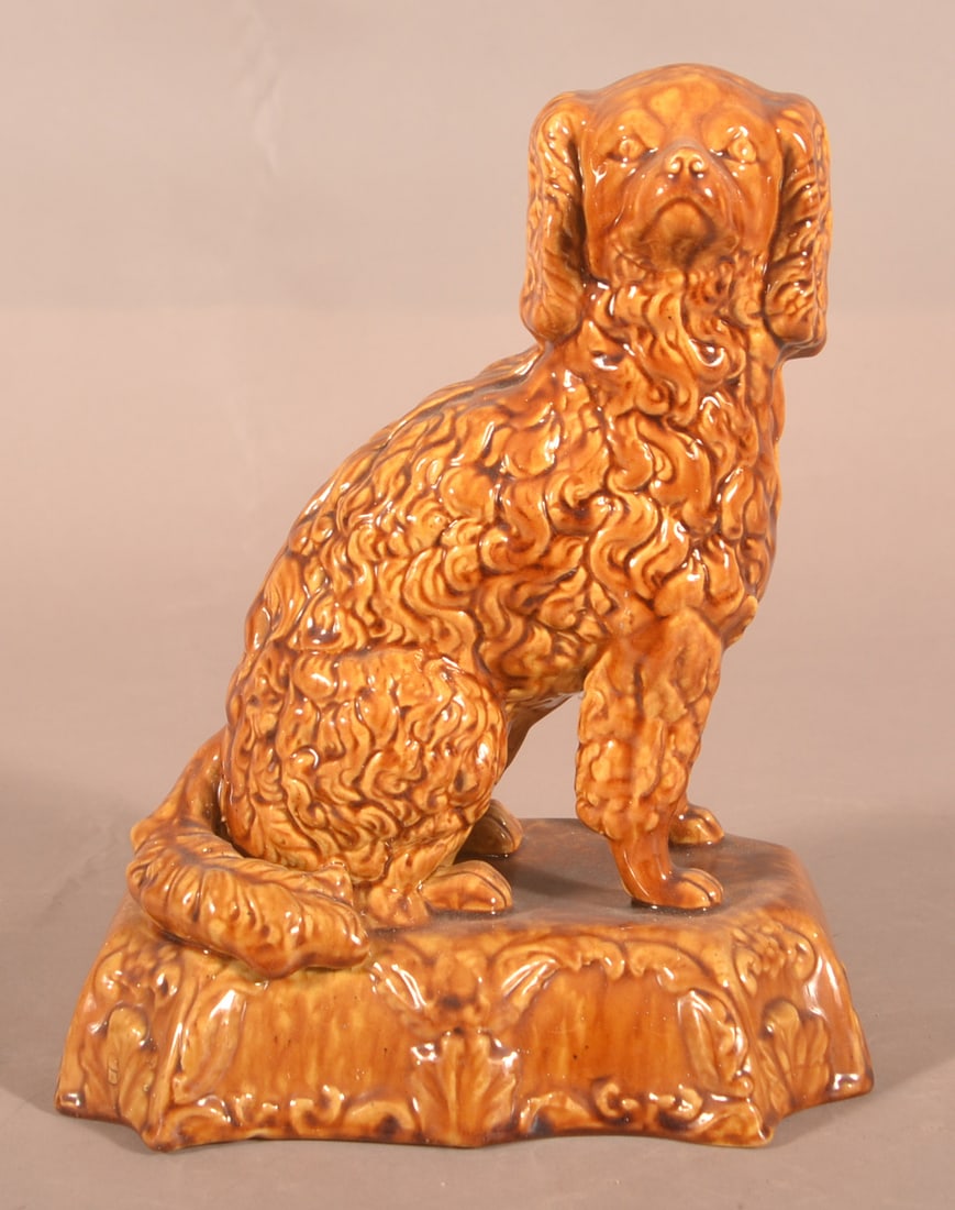 Rockingham Glazed Yellowware Seated Spaniel. (1 of 4)